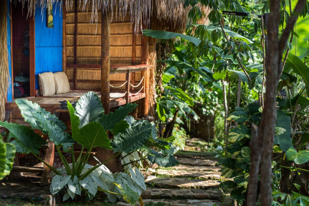 Sten Lodge blue bamboo hut outside